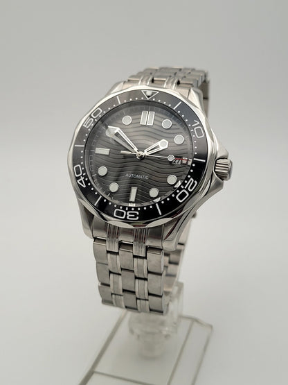 Men’s Automatic Dive Watch Wave Dial Black Ceramic Bezel Sapphire Steel 100M5